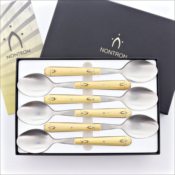 http://www.laguiole-imports.com/cdn/shop/products/Nontron-Steak-Knives-Flatware-Sets-Burned-Boxwood-Nontron-France-3_f80d579b-c3ff-404f-b583-6968088da560_600x.jpg?v=1629196515