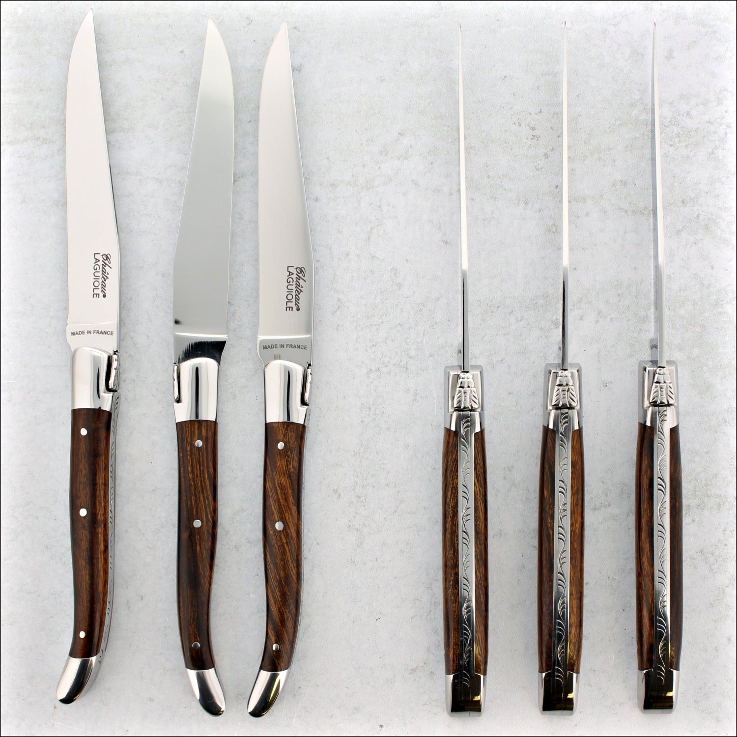 https://www.laguiole-imports.com/cdn/shop/files/Chateau-Laguiole-Heritage-Steak-Knives-Desert-Ironwood-Shiny-Finish-Chateau-Laguioler-Made-in-France-2.jpg?v=1704105211