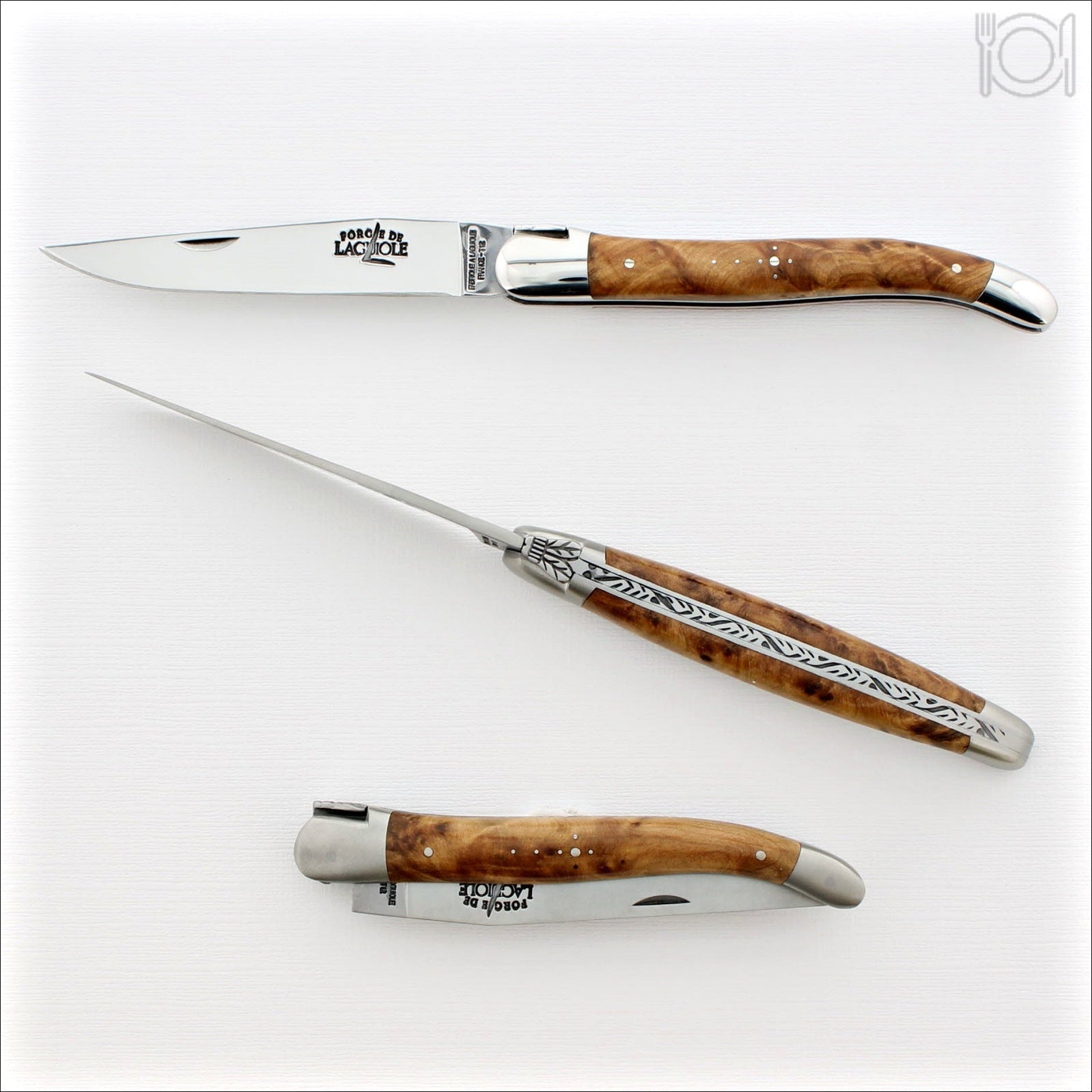 https://www.laguiole-imports.com/cdn/shop/products/Forge-de-Laguiole-Tradition-12-cm-Thuya-Burl-Forge-de-Laguiole_1600x.jpg?v=1685926103