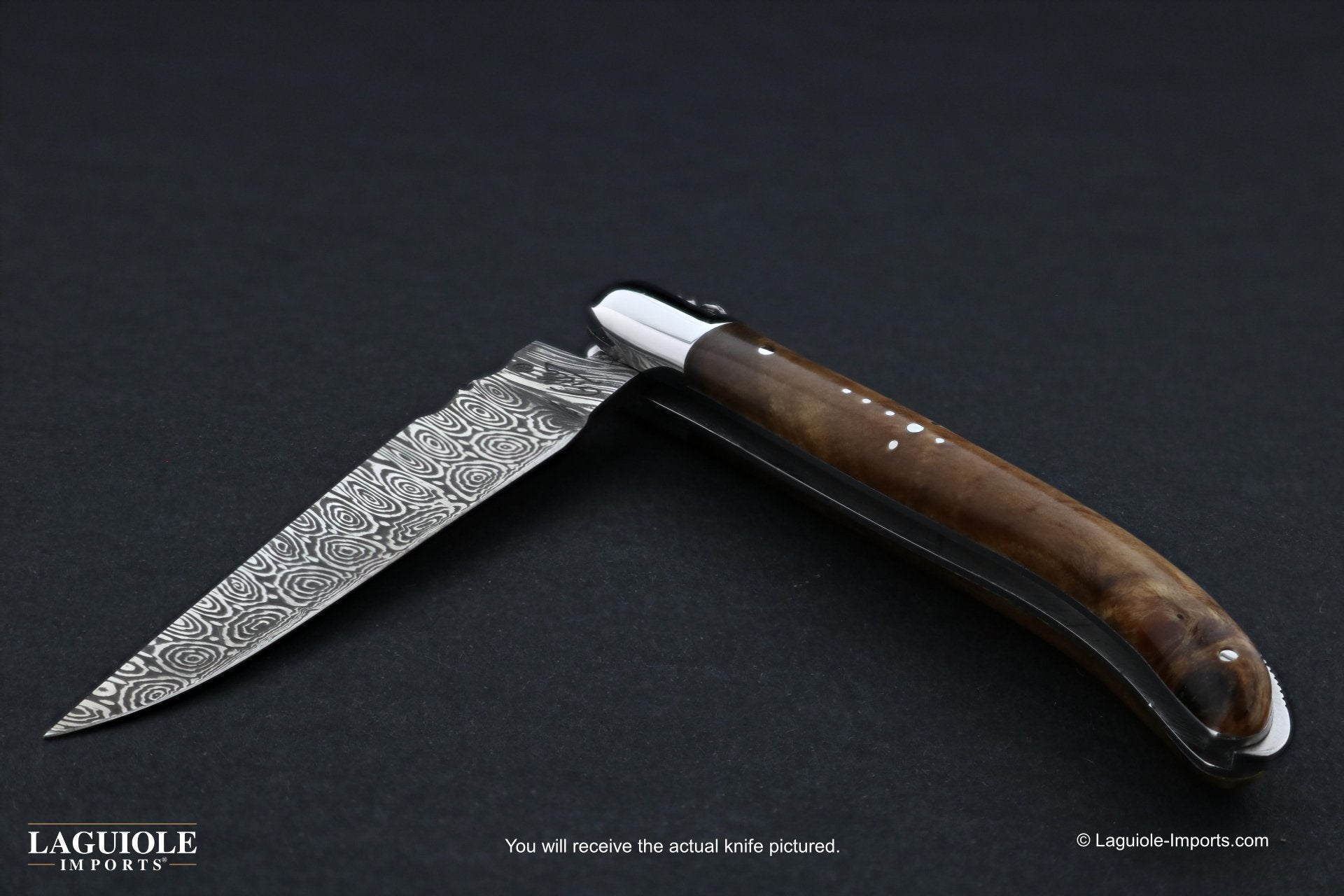 https://www.laguiole-imports.com/cdn/shop/products/Laguiole-XS-Damascus-Pocket-Knife-Burled-Poplar-Handle-Fontenille-Pataud-2_2000x.jpg?v=1634639513