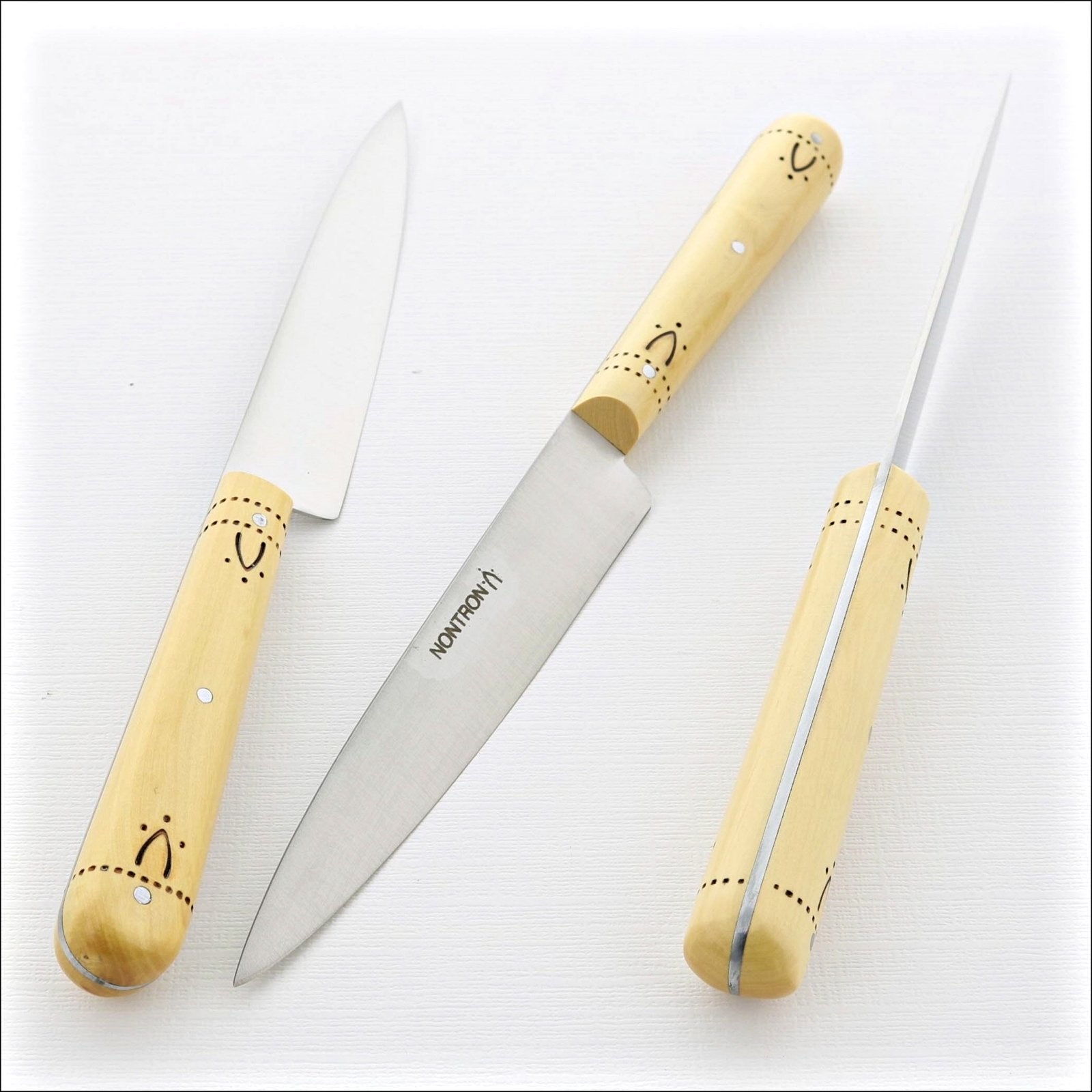 https://www.laguiole-imports.com/cdn/shop/products/Nontron-Paring-Kitchen-Knife-Ndeg12-Boxwood-Handle-Nontron-France-2.jpg?v=1633084266