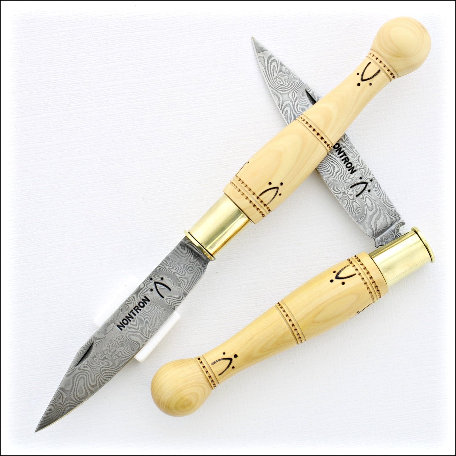 https://www.laguiole-imports.com/cdn/shop/products/Nontron-Pocket-Knife-No25-Damascus-Blade-Ball-Handle-Nontron-France-2_e9b1ff73-8802-4c13-bb48-23d5b00a2652.jpg?v=1636806179